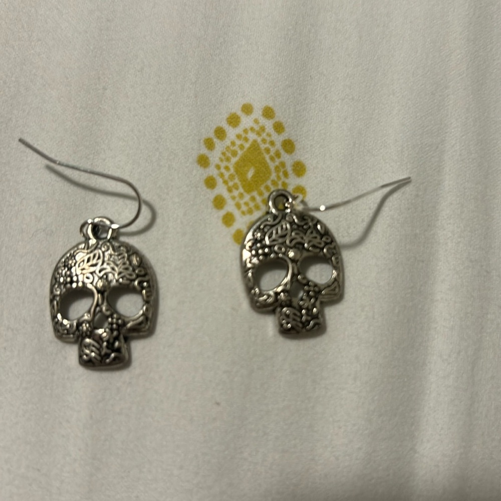 Silver tone sugar skulls